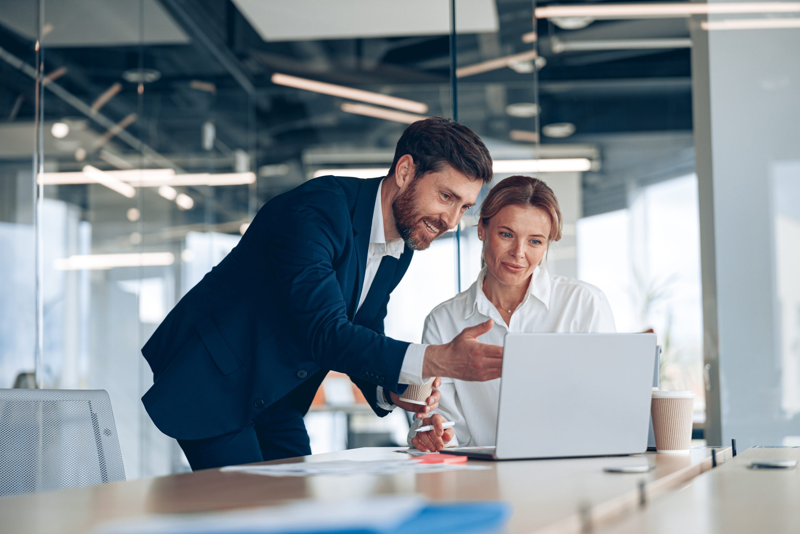 Female,Boss,Discussing,Online,Project,With,Employee,Showing,Presentation,To